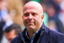 Arne Slot reacting on the touchline during Liverpool match.